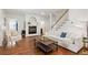 Cozy living room with a fireplace, hardwood floors, and comfortable seating at 2759 Arbor Se Ave, Atlanta, GA 30317