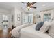 Bright bedroom featuring hardwood floors, a ceiling fan and ensuite bathroom at 2759 Arbor Se Ave, Atlanta, GA 30317
