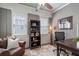 Office with a desk, shelves, comfortable chair, and lots of light at 2759 Arbor Se Ave, Atlanta, GA 30317
