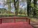 Backyard view from deck with wooded area at 5183 Mccarter Ct, Stone Mountain, GA 30088