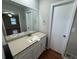 Bathroom vanity with updated countertop and mirror at 5183 Mccarter Ct, Stone Mountain, GA 30088