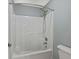 Bright bathroom with a tub shower and silver fixtures at 3544 Candytuft Run, Auburn, GA 30011