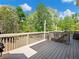 Open deck with grill, ideal for entertaining with spacious views of a lush yard at 3544 Candytuft Run, Auburn, GA 30011