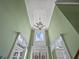 Grand foyer with high ceilings and chandelier at 3544 Candytuft Run, Auburn, GA 30011