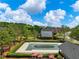 Community pool and green space, viewed from above, highlighting the neighborhood's recreational amenities at 3544 Candytuft Run, Auburn, GA 30011