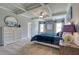 Spacious main bedroom with coffered ceilings, large windows and a walk in closet at 700 Relic Rdg, Hampton, GA 30228