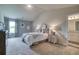 This main bedroom offers a tranquil retreat, featuring soft colors and an ensuite bathroom at 700 Relic Rdg, Hampton, GA 30228