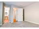 Cozy bedroom with carpet and closet doors at 974 Regal Hills Ln, Mableton, GA 30126
