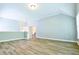 Large bonus room or loft with vaulted ceilings and neutral paint at 974 Regal Hills Ln, Mableton, GA 30126