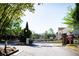 Gated entrance to residential community with manicured landscaping and security features at 974 Regal Hills Ln, Mableton, GA 30126