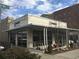 Exterior of J. Christopher's Breakfast & Lunch restaurant, featuring large windows and outdoor seating at 120 Winsome Way, Woodstock, GA 30188