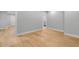 Modern basement with hardwood floors and white trim at 270 Boulder Dr, Roswell, GA 30075