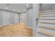 Spacious basement area with stairs, doors, and a modern design at 270 Boulder Dr, Roswell, GA 30075