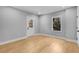 Finished basement with hardwood floors and a bright, neutral paint at 270 Boulder Dr, Roswell, GA 30075