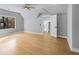 Angled ceiling bedroom with neutral paint, hardwood floors, and a window at 270 Boulder Dr, Roswell, GA 30075