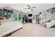 Large bedroom with carpet, neutral walls, ample storage and display options, and a large window at 2009 Westside Ln, Woodstock, GA 30189