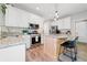Stylish kitchen with granite countertops, stainless steel appliances, a breakfast bar, and plenty of storage at 2009 Westside Ln, Woodstock, GA 30189