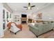 Comfortable living room with a stone fireplace, shiplap accents, and ample seating space at 2009 Westside Ln, Woodstock, GA 30189