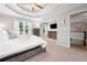 Bright main bedroom shows access to an adjoined room and comfortable sleeping area at 2009 Westside Ln, Woodstock, GA 30189