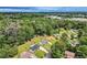 This is an aerial view of a property that shows the mature trees, nearby buildings and landscape at 2714 Preston Dr, Decatur, GA 30034