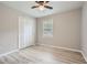This is a simple bedroom featuring light gray walls, closet and natural light at 2714 Preston Dr, Decatur, GA 30034