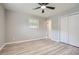 Bedroom with hardwood floors, neutral walls, ceiling fan, and closet at 2714 Preston Dr, Decatur, GA 30034