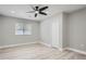 This is a simple bedroom featuring light gray walls, a ceiling fan and natural light at 2714 Preston Dr, Decatur, GA 30034