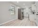 Spacious kitchen with stainless steel refrigerator, white cabinets, and hardwood floors at 2714 Preston Dr, Decatur, GA 30034