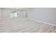 Bright, airy living area with modern LVP flooring and sliding glass doors at 2714 Preston Dr, Decatur, GA 30034