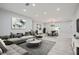 Open-concept living and dining area with modern decor, LVP floors, and plenty of light at 2714 Preston Dr, Decatur, GA 30034