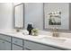 Bright bathroom with double vanity, white countertops, and modern fixtures at 6180 Misty Hill Ln, Buford, GA 30518
