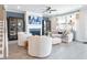 Modern living room with fireplace, large windows, and comfortable seating for relaxation at 6180 Misty Hill Ln, Buford, GA 30518