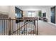 Upstairs view into a game-ready loft featuring modern decor and entertainment area at 6180 Misty Hill Ln, Buford, GA 30518
