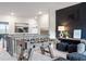 Loft featuring a foosball table and stylish decor, perfect for Gathering entertainment at 6180 Misty Hill Ln, Buford, GA 30518