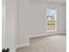 Bedroom with neutral carpet and a double-hung window at 171 Basil Street Dr, Cumming, GA 30040