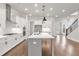 Bright kitchen with modern fixtures, stainless appliances, and an open layout at 171 Basil Street Dr, Cumming, GA 30040