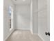 This walk-in closet has neutral carpet and wire shelving at 171 Basil Street Dr, Cumming, GA 30040