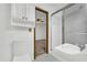 This bathroom features a vanity, toilet, and shower at 2027 Kensington High Sw St, Lilburn, GA 30047