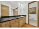 Bathroom with a granite countertop and a view to the toilet room at 2027 Kensington High Sw St, Lilburn, GA 30047