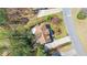 Aerial view of a well-maintained house with a brown roof and manicured lawn at 2195 Brickton Sta, Buford, GA 30518