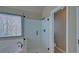 Modern bathroom with glass enclosed shower and bathtub at 2195 Brickton Sta, Buford, GA 30518