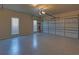 Spacious two car garage with sealed floor, garage door opener and windows for natural light at 2195 Brickton Sta, Buford, GA 30518