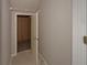 A walk in closet with wire shelving and carpeted floor seen from an open door at 2195 Brickton Sta, Buford, GA 30518