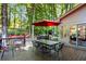 Relaxing backyard with deck, patio, and fire pit, perfect for outdoor enjoyment and entertaining guests at 2801 Livsey Dr, Tucker, GA 30084