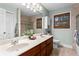 Inviting bathroom featuring a double sink vanity, walk-in shower and plenty of natural light at 2801 Livsey Dr, Tucker, GA 30084
