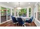 Dining room features a large window with views of a deck and backyard area at 2801 Livsey Dr, Tucker, GA 30084
