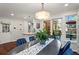 Dining room features views of a backyard deck, patio, and serving counter space at 2801 Livsey Dr, Tucker, GA 30084