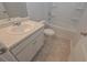 Full bathroom includes sink, toilet, and shower-tub combination at 484 Charleston Pl, Villa Rica, GA 30180