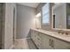 Elegant bathroom with double vanity, marble floors and modern fixtures at 6603 Sterling Dr, Atlanta, GA 30328