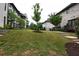 A complex with manicured lawn and garden areas provides a tranquil community setting at 6603 Sterling Dr, Atlanta, GA 30328